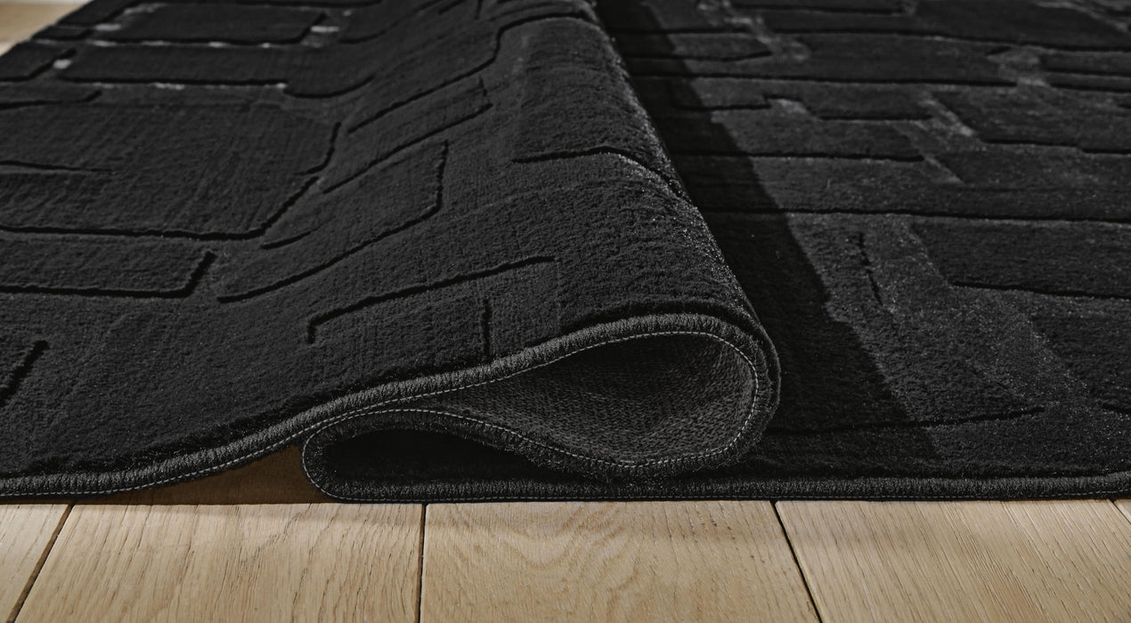 Five Star Furniture - Gibbswell Washable 5' x 7' Area Rug